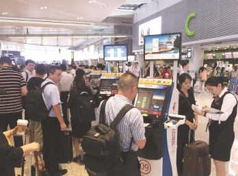 体育在线论坛:上海两大机场增加自助设备 打造“无纸化”通行流程